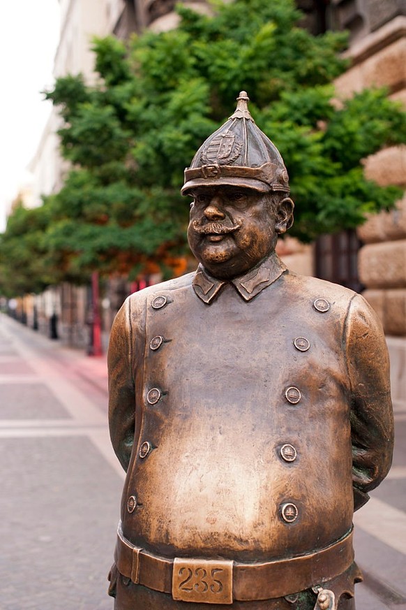 Hungarian policeman statue on Zrinyi Utca in Budapest. (Photo by: Loop Images/Universal Images Group via Getty Images)