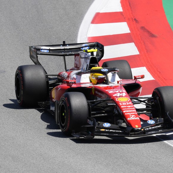 Lewis Hamilton a fêté dimanche son 1er succès au volant d'une Ferrari