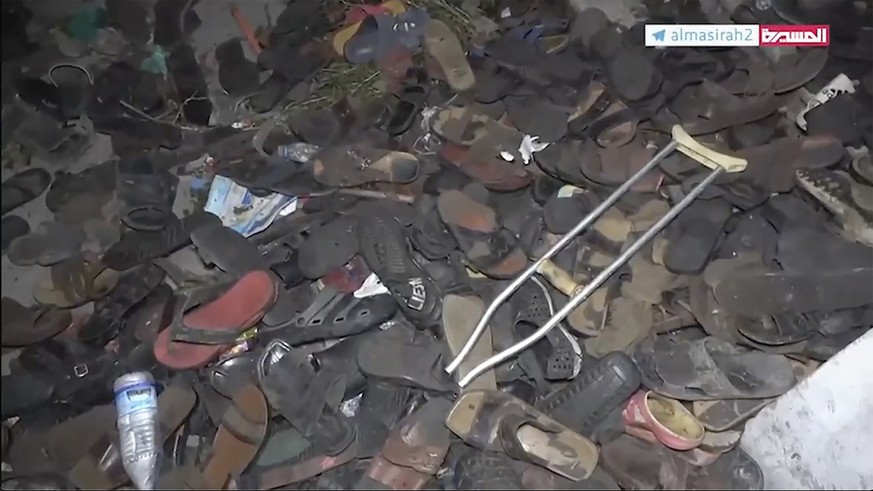 This image from a video, shows the aftermath of a deadly stampede in Sanaa, Yemen Wednesday, April 19, 2023. A crowd apparently spooked by gunfire and an electrical explosion stampeded at an event to  ...