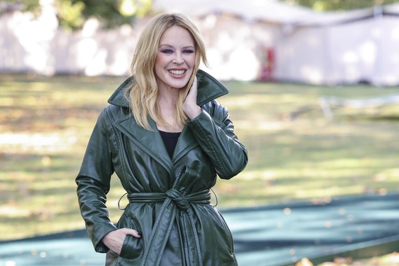Kylie Minogue poses for photographers upon arrival at the Burberry Spring Summer 2024 fashion show on Monday, Sept. 18, 2023 in London. (Vianney Le Caer/Invision/AP)
Kylie Minogue