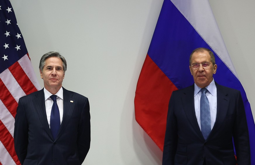 epa09213989 A handout photo made available by the press service of the Russian Foreign Affairs Ministry shows Russian Foreign Minister Sergei Lavrov (R) and US Secretary of State Antony Blinken (L) du ...
