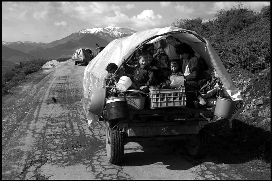Ethnic Albanian refugees ride their tractors from Kukes to Kruma on Saturday, April 24, 1999. The United Nations High Commissioner for Refugees (UNHCR) is urging ethnic Albanians to leave the border a ...