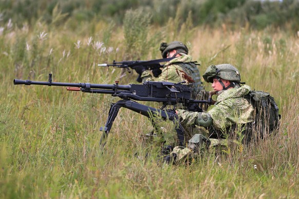 epa10163927 A handout photo made available by the press service of the Russian Defence Ministry on 06 September 2022 shows Russian servicemen taking part in the Vostok 2022 strategic command and staff ...