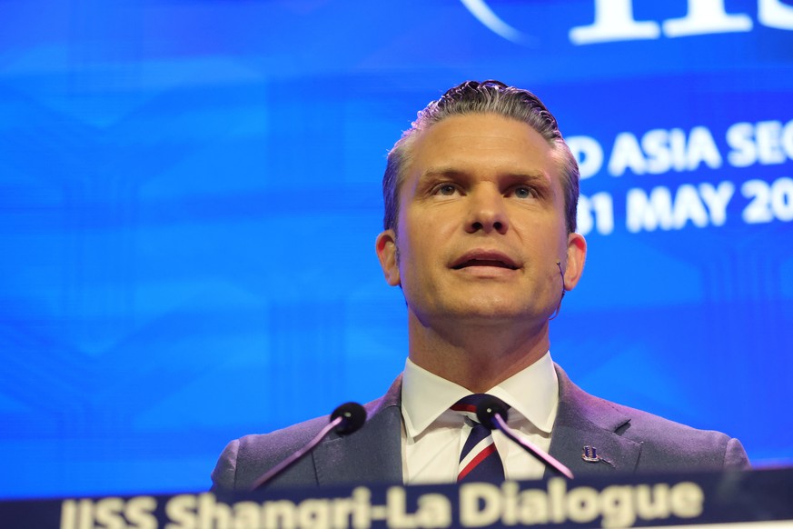 epa13003785 US Secretary of Defense Pete Hegseth delivers his speech during a plenary session of the International Institute for Strategic Studies (IISS) Shangri-la Dialogue Defence Summit in Singapor ...