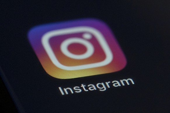 FILE - This photo shows the Instagram app icon on the screen of a mobile device on Aug. 23, 2019. Russian regulators said Friday, March 11, 2022, that internet users in the country will be blocked fro ...