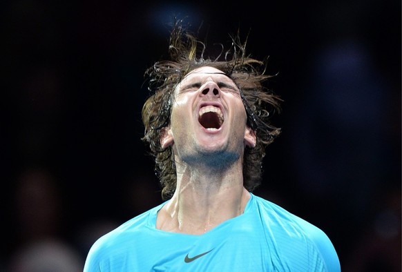 epa03941857 Spain&#039;s Rafael Nadal reacts after his two set to one win over Tomas Berdych of the Czech Republic during a singles Barclays ATP World Tour Finals tennis match at the O2 Arena in Londo ...