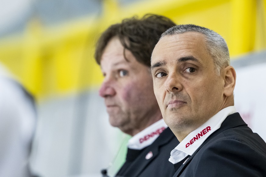 Newly promoted Swiss Head Coach Jan Cadieux, right, and his Skills Coach Paul DiPietro, look on during Cadieux' first match as Head Coach of the national team, a friedly ice hockey match between  ...