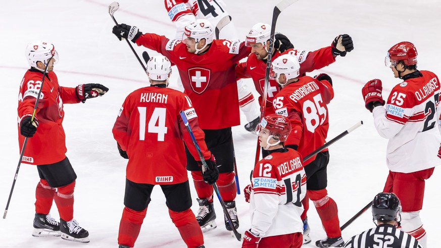 Switzerland&#039;s forward Nino Niederreiter #22 celebrates his goal with his teammates Switzerland&#039;s forward Denis Malgin #62, Switzerland&#039;s defender Dean Kukan #14, Switzerland&#039;s forw ...