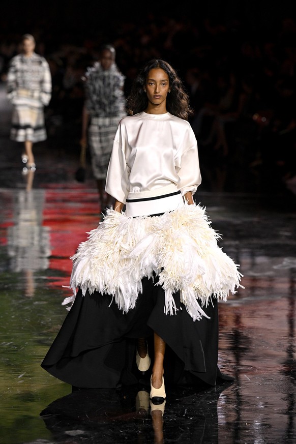 PARIS, FRANCE - OCTOBER 06: (EDITORIAL USE ONLY - For Non-Editorial use please seek approval from Fashion House) A model walks the runway during the Chanel Womenswear Spring/Summer 2026 show as part o ...