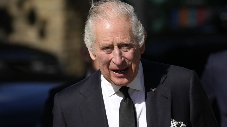 FILE - King Charles III arrives to thank emergency service workers for their work and support ahead of the funeral of Queen Elizabeth II at the Metropolitan Police Service Special Operations Room in L ...