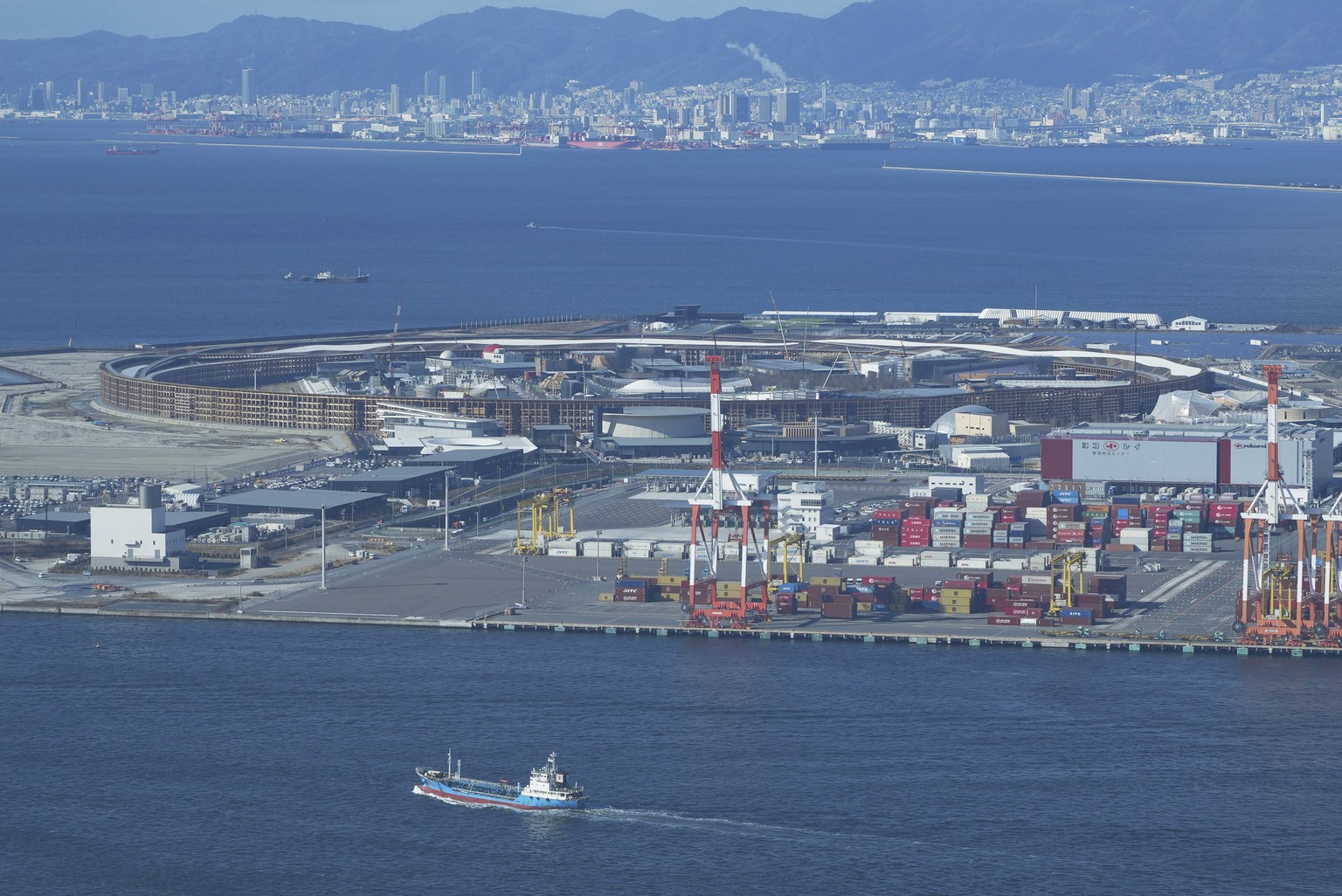 The Grand Ring, a symbolic wooden structure for the 2025 World Exposition, circulates its site on Yumeshima, an artificial island in Osaka, Friday, Jan. 17, 2025. (AP Photo/Ayaka McGill)