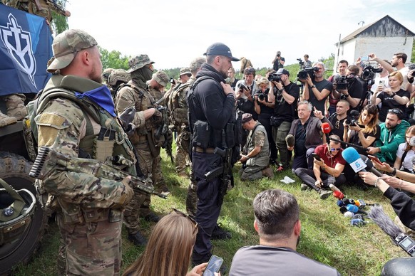 NORTHERN UKRAINE - MAY 24, 2023 - Russian Volunteer Corps (RDK) leader Denis &#039;White Rex&#039; Nikitin speaks to the press during a briefing near the border in northern Ukraine. (Photo credit shou ...