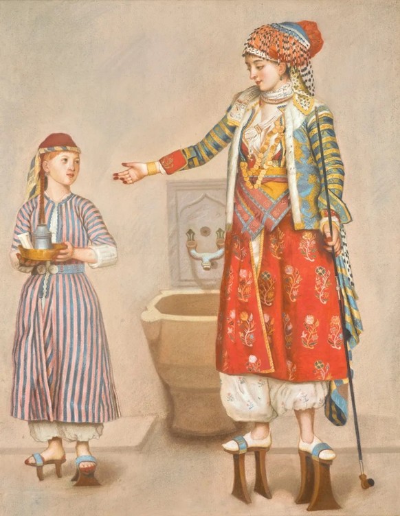Dans l’Empire ottoman, les qabqab servaient à protéger les pieds de la chaleur et de l&#039;eau au hammam: «Dame turque et sa servante», peinture de Jean-Étienne Liotard vers 1742/43.
https://commons. ...