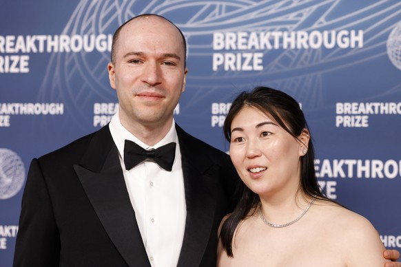 epa12013030 Greg Brockman (L) and Anna Brockman (R) attend the eleventh annual Breakthrough Prize Ceremony at The Barker Hangar in Santa Monica, California, USA, 05 April 2025. EPA/CAROLINE BREHMAN