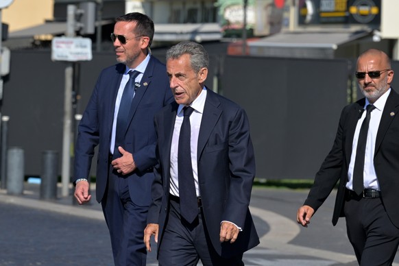 epa13110995 French former President Nicolas Sarkozy arrives to attend the 10th anniversary of the deadly 2016 truck attack in Nice, southern France, 14 July 2026. On 14 July 2016, a 19-tonne refrigera ...