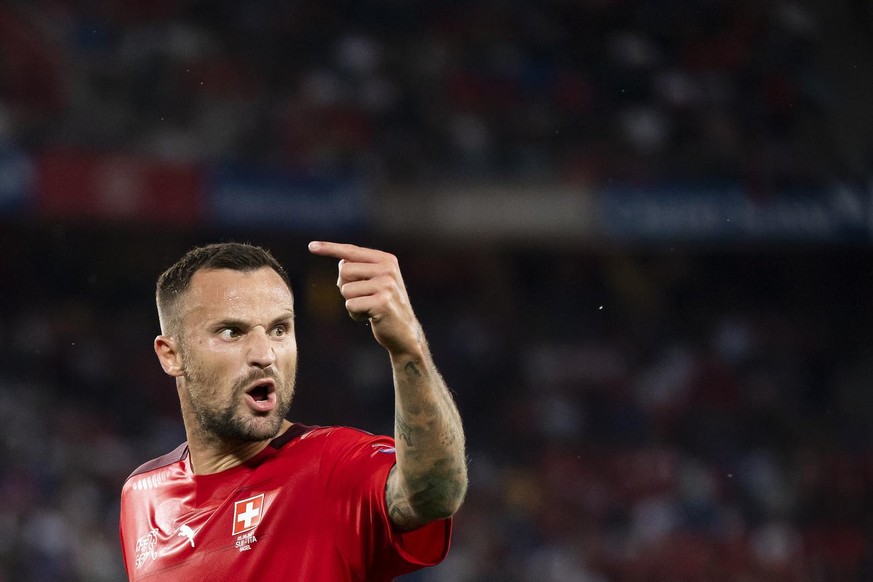 Switzerland&#039;s Haris Seferovic, reacts during the 2022 FIFA World Cup European Qualifying Group C soccer match between Switzerland and Italy at the St. Jakob-Park stadium in Basel, Switzerland, on ...