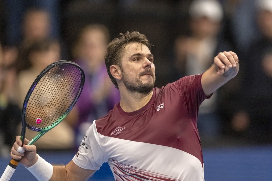 Switzerland&#039;s Stan Wawrinka cheers after winning his first round match against Norway&#039;s Casper Ruud at the Swiss Indoors tennis tournament at the St. Jakobshalle in Basel, Switzerland, on Tu ...