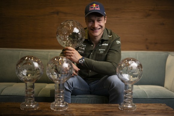 Marco Odermatt of Switzerland poses with his crystal globes for Giant Slalom, Super-G, Downhill, and Overall, after the men&#039;s downhill race at the FIS Alpine Skiing World Cup finals in Saalbach-H ...