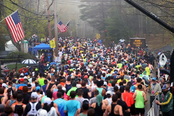Hopkinton, MA - April 17: A large crowd of runners start the 127th Boston Marathon. (Photo by David L. Ryan/The Boston Globe via Getty Images)