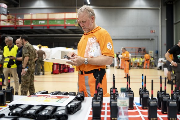 Sebastian Eugster, Teamleader of the Swiss Rescue Chain prapares prior the departure in the Zurich Airport in Kloten, Switzerland on Thursday, 25. June 2026. Following the two devastating earthquakes  ...