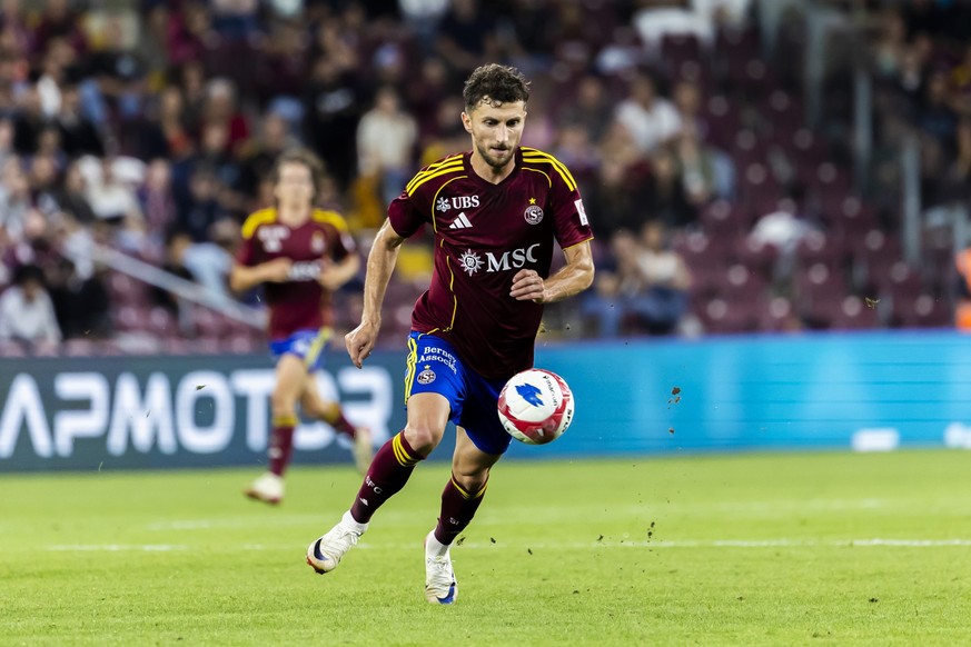Servette's midfielder Miroslav Stevanovic controls the ball, during the UEFA Champions League Second qualifying round 2nd leg soccer match between Servette FC and FC Viktoria Plzen, at the Stade  ...