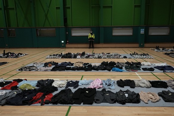 Clothes collected from the scene of a deadly accident following Saturday night&#039;s Halloween festivities, are placed at a temporary lost and found center at a gym in Seoul, South Korea, Tuesday, No ...