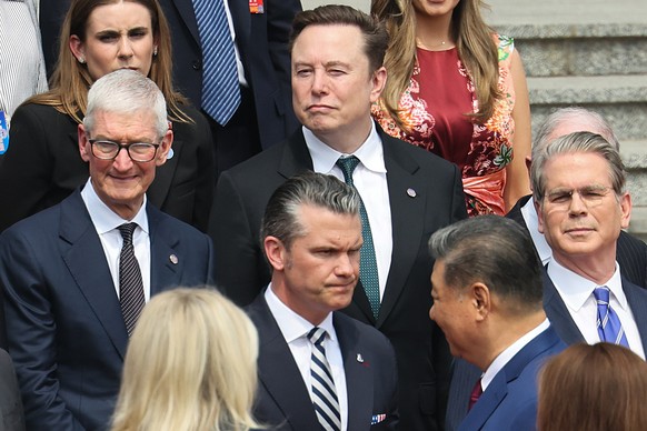 Apple CEO Tim Cook, Tesla CEO Elon Musk, U.S. Defense Secretary Pete Hegseth and U.S. Treasury Secretary Scott Bessent attend the welcome ceremony for U.S. President Donald Trump by Chinese President  ...