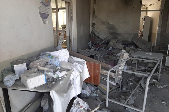 A damaged clinic is seen after airstrikes in Lashkar Gah city of Helmand province, south of Kabul, Afghanistan, Sunday, Aug. 8, 2021. Airstrikes in southern Afghanistan damaged a health care clinic an ...