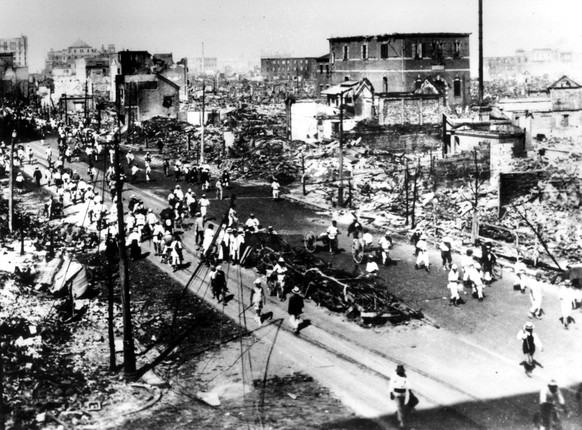 The Nihonbashi district, one of the busiest areas in Tokyo, is pictured in ruins after an 8.3 magnitude earthquake struck near the Japanese capital on Sept. 1, 1923, killing more than 140,000 people.  ...