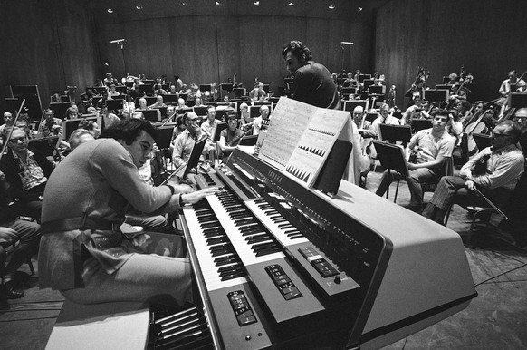 FILE - Composer Lalo Schifrin, left, rehearses with the Los Angeles Philharmonic under Zubin Mehta&#039;s direction for the world premiere of his &quot;Pulsations&quot; in Los Angeles on Jan. 27, 1971 ...