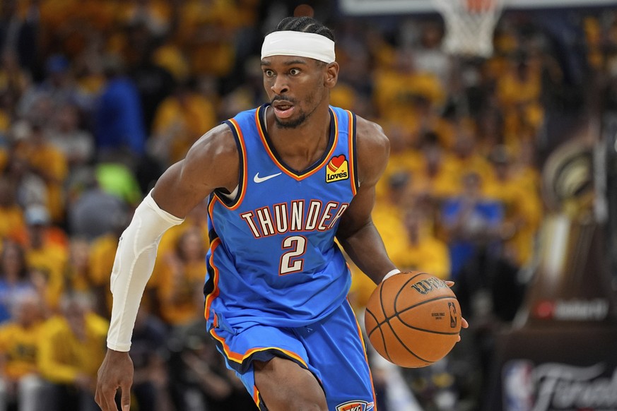 Oklahoma City Thunder guard Shai Gilgeous-Alexander (2) moves the ball up court against the Indiana Pacers during the second half of Game 6 of the NBA Finals basketball series, Thursday, June 19, 2025 ...