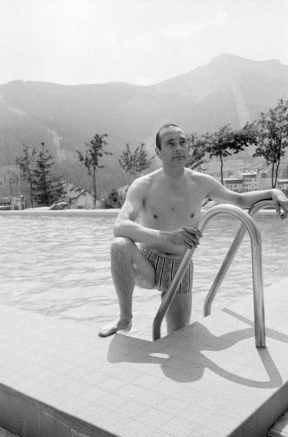 AURON, FRANCE - AUGUST 18: Jacques Chirac in swimming pooll during vacation in Auron, mountain resort of French southern Alps, with wife Bernadette and daughter Claude, on August 18, 1974 in Auron , F ...