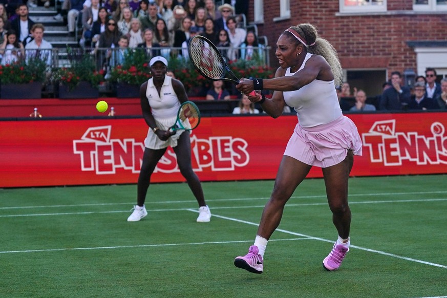 Serena Williams of the United States, right, hits a return as she and playing partner Victoria Mboko of Canada play against Nicole Melichar-Martinez of Canada and Erin Routliffe of New Zealand during  ...