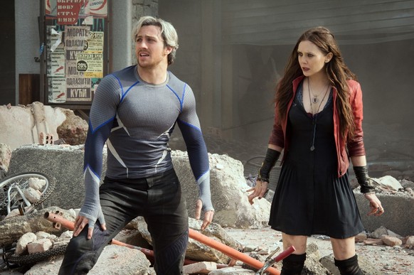 This photo provided by Disney/Marvel shows, Aaron Taylor-Johnson, left, as Quicksilver/Pietro Maximoff , and Elizabeth Olsen as Scarlet Witch/Wanda Maximoff, in a scene from the film, &quot;Avengers:  ...