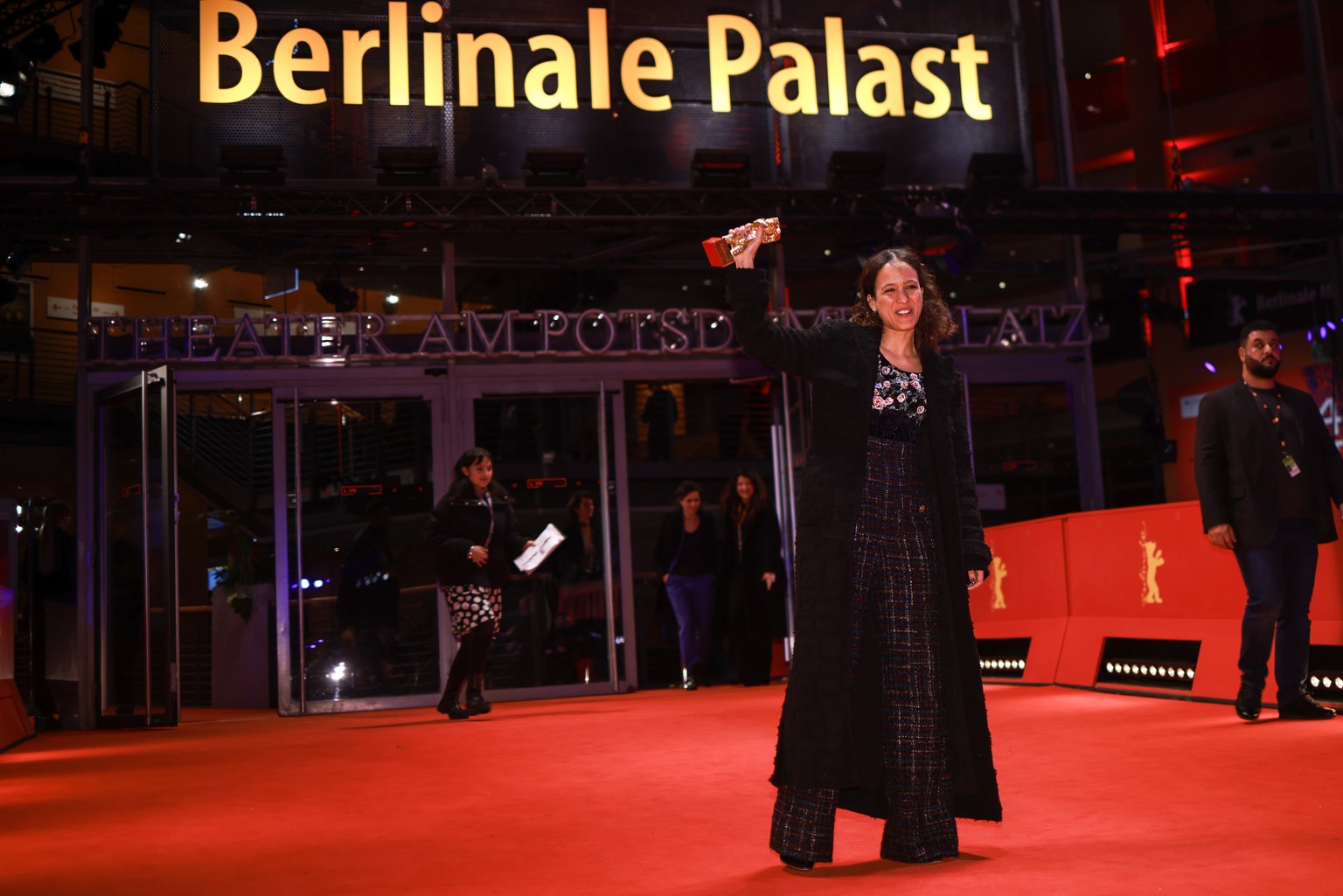 epa11179164 Mati Diop poses with her Golden Bear for Best Film for ?Dahomey? after the award ceremony during the 74th Berlin International Film Festival &#039;Berlinale&#039; in Berlin, Germany, 24 Fe ...