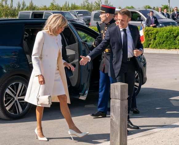 VER-SUR-MER, FRANCE - JUNE 6: Emmanuel Macron and Brigitte Macron attend the UK Ministry of Defence and the Royal British Legion’s commemorative event at the British Normandy Memorial to mark the 80th ...
