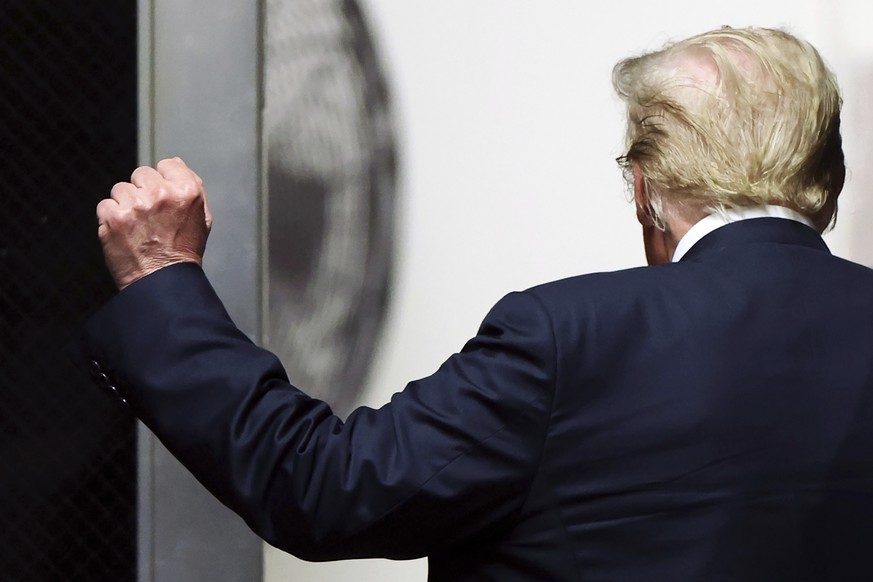 Former President Donald Trump walks to the courtroom at Manhattan criminal court as jurors are expected to begin deliberations in his criminal hush money trial in New York, Wednesday, May 29, 2024. (C ...