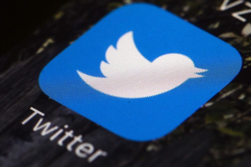 FILE - In this April 26, 2017, file photo is a Twitter app icon on a mobile phone in Philadelphia. On Friday, March 25, 2022, The Associated Press reported on stories circulating online incorrectly cl ...