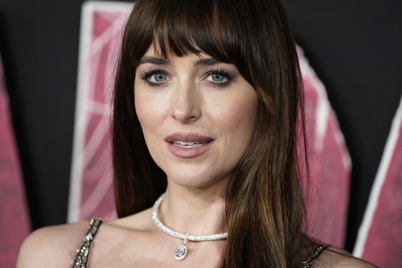Dakota Johnson arrives at the premiere of &quot;Madame Web,&quot; Monday, Feb. 12, 2024, at the Regency Village Theatre in Los Angeles. (Photo by Jordan Strauss/Invision/AP)
Dakota Johnson