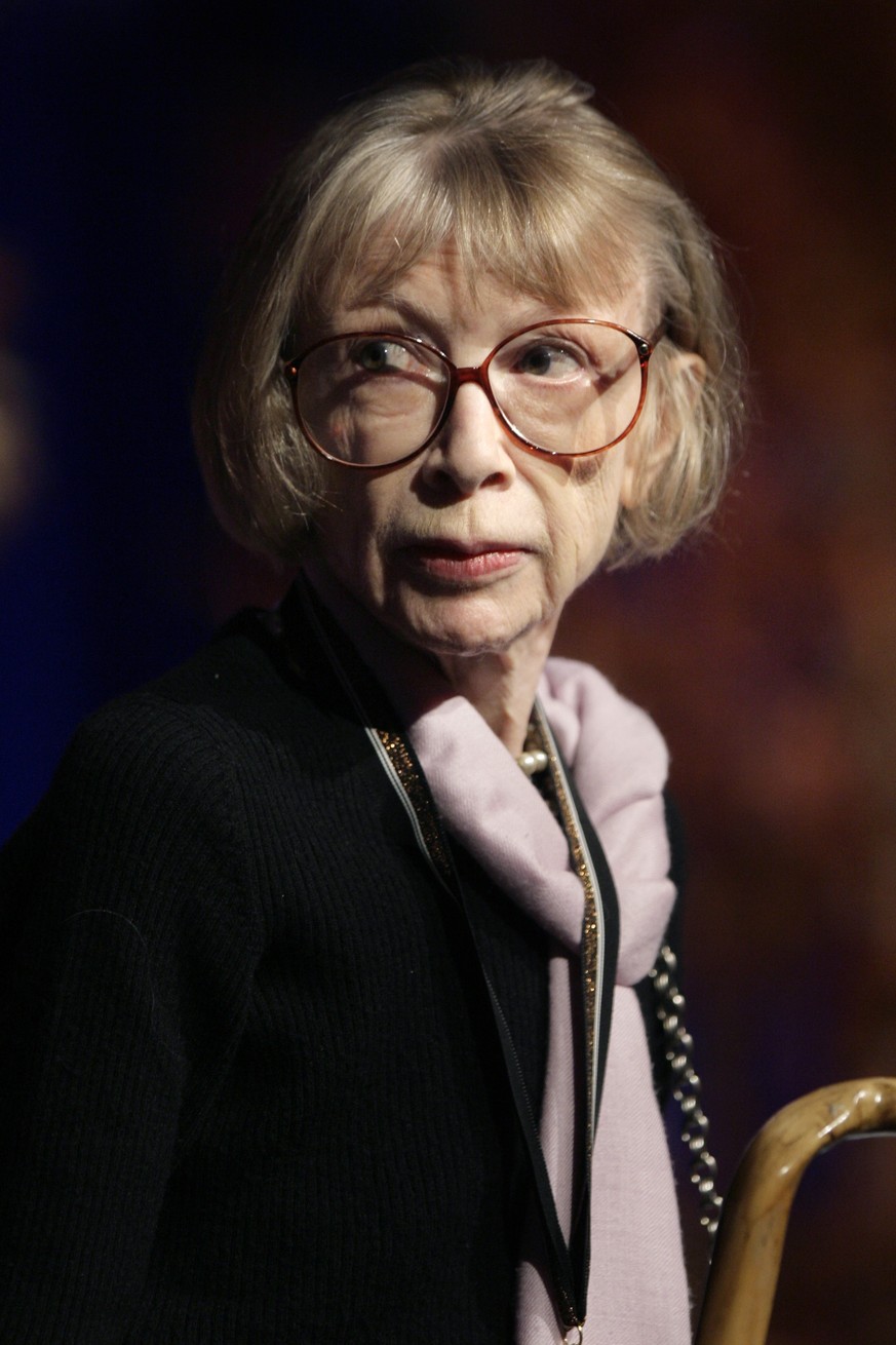 FILE - Author Joan Didion accepts the 2007 Medal for Distinguished Contribution to American Letters at the 58th National Book Awards in New York, Wednesday, Nov. 14, 2007. Didion, the revered author a ...