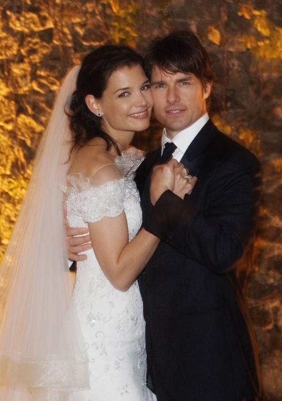 BRACCIANO, ITALY - NOVEMBER 18: In this handout photo provided by Robert Evans, Tom Cruise and Katie Holmes pose together at Castello Odescalchi on their wedding day November 18, 2006 in Bracciano, ne ...