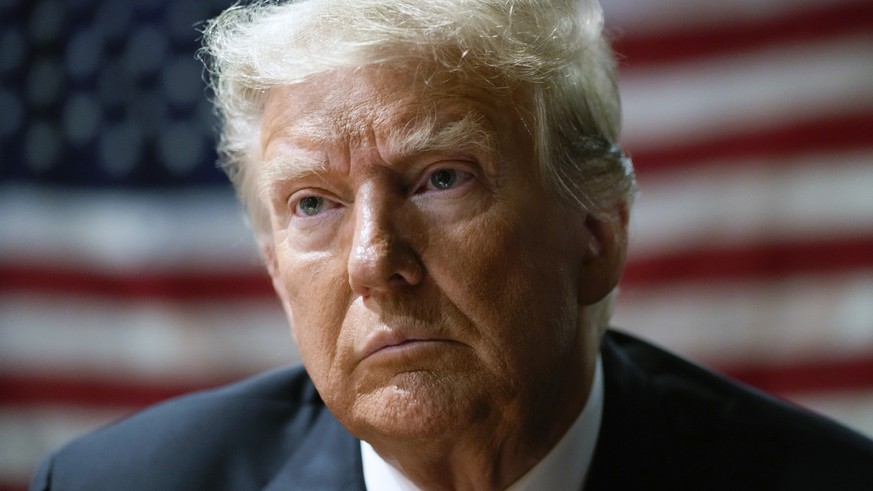 FILE - Former President Donald Trump attends an event with supporters at the Westside Conservative Breakfast, in Des Moines, Iowa, Thursday, June 1, 2023. Trump described a Pentagon ?plan of attack? a ...