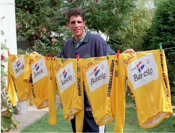 Spain (Espana): A file photo dated 22 July 1996 of Spanish five-time winner of Tour de France cyclist Miguel Indurain posing after his fifth Tour de France win with five yellow jerseys he won from 199 ...