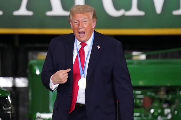 President Donald Trump wears a gold medal from Olympic speedskater Jordan Stolz at Custer Farms in Chippewa Falls, Wis., Friday, June 5, 2026. (AP Photo/Glen Stubbe)
Trump