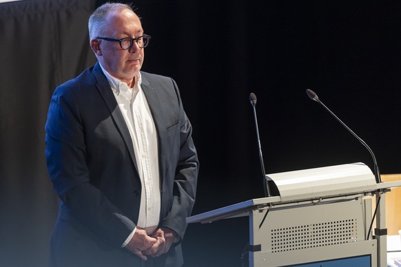 epa13042216 Nicolas Feraud, mayor of Crans-Montana, observes a minute of silence during a primary assembly in Crans-Montana, Switzerland, 16 June 2026, over the deadly fire at Le Constellation. Forty- ...