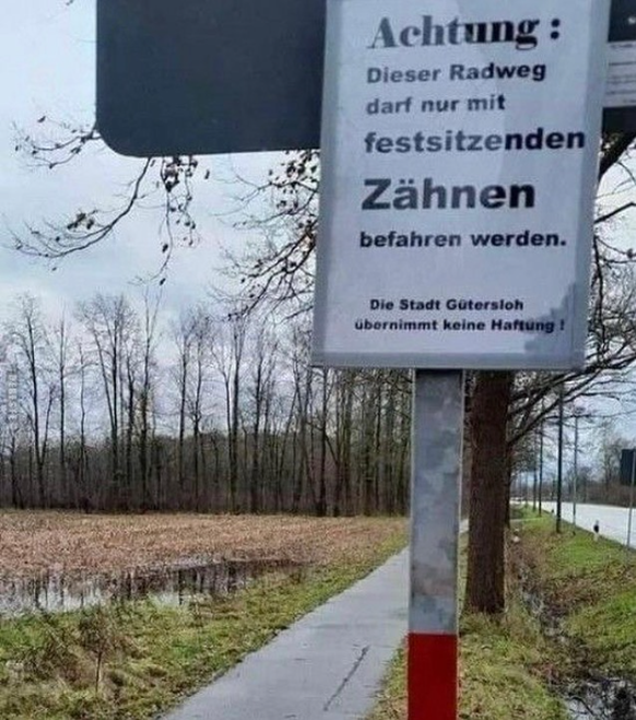 Lustiges Schild: Nur für Leute mit festsitzenden Zähnen