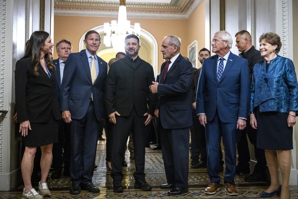 epa13138475 Ukrainian President Volodymyr Zelenskyy (C) arrives for a meeting with US senators at the US Capitol in Washington, DC, USA, 28 July 2026. Zelenskyy visited Washington to attend the funera ...