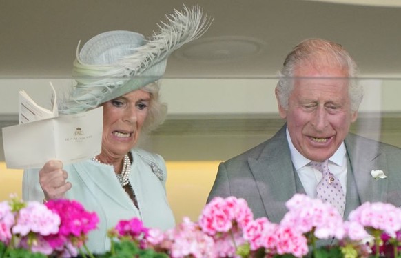 ASCOT, UNITED KINGDOM - JUNE 24: (EMBARGOED FOR PUBLICATION IN UK NEWSPAPERS UNTIL 24 HOURS AFTER CREATE DATE AND TIME) Queen Camilla, King Charles III and Lady Gabriella Windsor watch, from the Royal ...