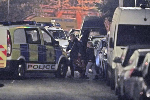 Police evacuate local residents during an incident at an address in Rutland Avenue in Sefton Park after an explosion at Liverpool Women&#039;s Hospital in Liverpool, England Sunday Nov. 14, 2021. Brit ...