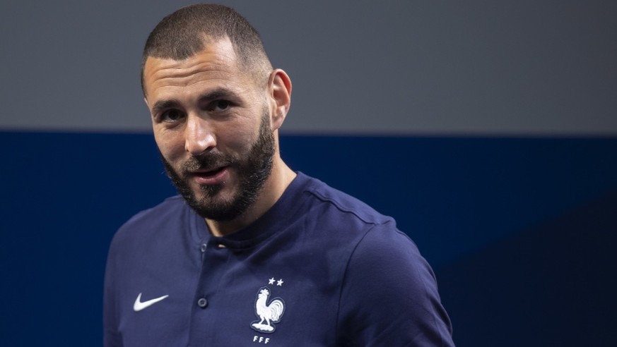epa09237162 French national soccer team striker Karim Benzema attends a press conference in Clairefontaine-en-Yvelines, outside Paris, France, 30 May 2021. Benzema has been selected to be part of Fran ...